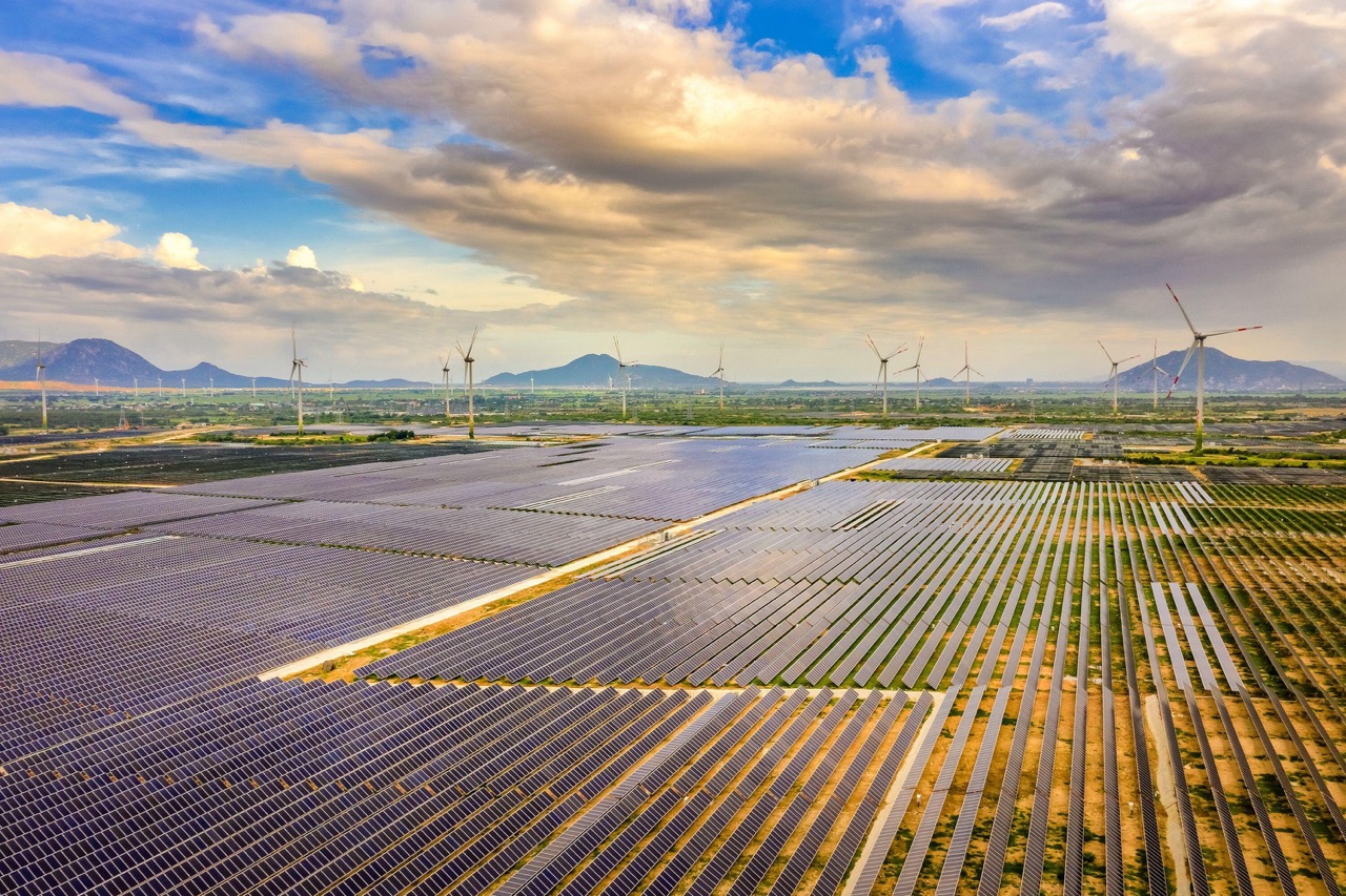 Aerial view of the Solar panel, photovoltaic, alternative electricity source with a wind turbines, Phan Rang, Ninh Thuan, Vietnam